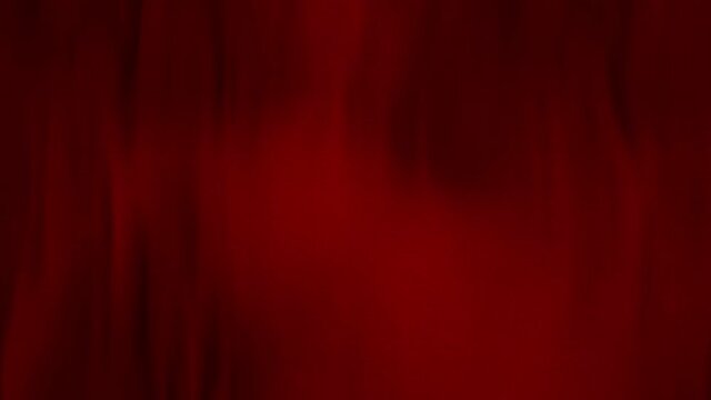 Abstract full-frame red flag cloth with selective focus waving in the wind. Concept 3D animation loop background of colored garment with velvet satin texture as copy space backdrop and web banner.