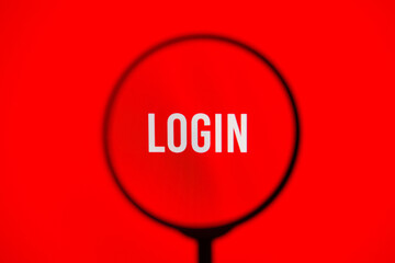 Text login on red screen through magnifying glass.
