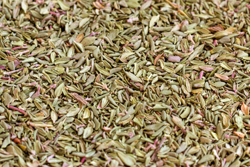 Dried and crushed thyme grass (Thymus). A fragrant plant used in medicine, cooking and cosmetology.