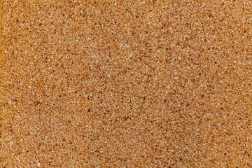 Brown polished sandstone wall texture and seamless background