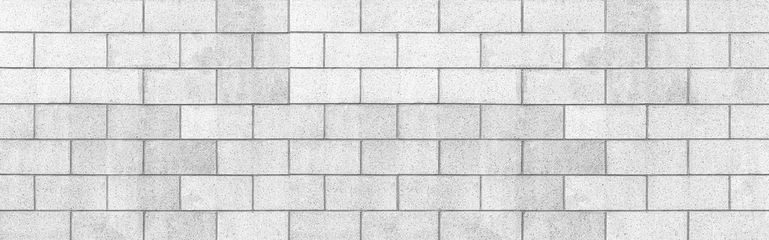 Fototapeten Konkrete Panorama of White cement block fence texture and seamless background  © torsakarin