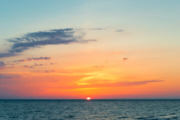 Obraz premium Beautiful orange sunset on the sea landscape