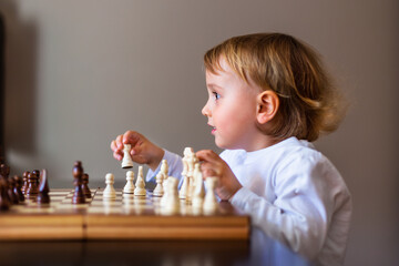 chess, chessboard, child, playing,learning,  activity, board, boy, caucasian, chessmen, childhood, clever, competition, competitive, concentrated, concentration, cute, development, education, face, fu