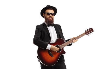 Beared musician playing an acoustic guitar