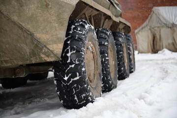 green armored personnel carrier in winter