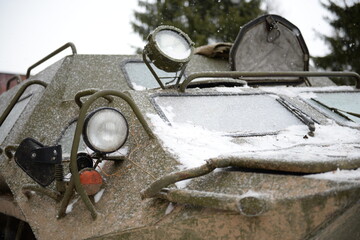 green armored personnel carrier in winter