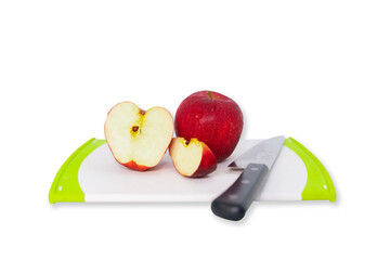 Aplles slices , knife and cutting board on isolate white background.
