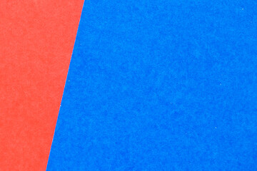 Fototapeta premium Abstract red and blue color paper textured background with copy space for design and decoration