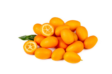 Top view of bunch of fresh kumquats in the organic food market. Some kumquats is cutted