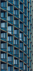 Obraz premium Pattern, background with modern office building and facade