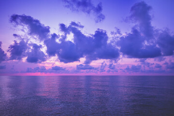 Naklejka na ściany i meble Seascape in the evening. Sunset over the sea with beautiful sky