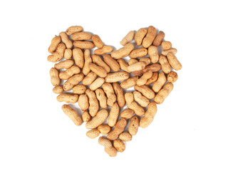 Group of peanuts in heart form dry isolated on the white background