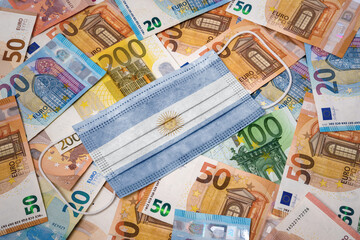 Medical mask with the flag of Argentina on a variety of european banknotes.(series)