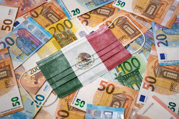 Obraz na płótnie Canvas Medical mask with the flag of Mexico on a variety of european banknotes.(series)