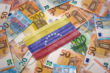 Medical mask with the flag of Venezuela on a variety of european banknotes.(series)