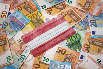 Medical mask with the flag of Austria on a variety of european banknotes.(series)