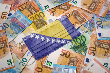 Medical mask with the flag of Bosnia and Herzegovina on a variety of european banknotes.(series)