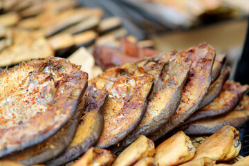 Selection of assorted home made smoked fish on a farmer's market in Vilnius, Lithuania.