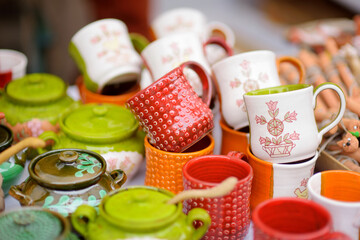 Ceramic dishes, tableware and jugs sold on Easter market in Vilnius. Lithuanian capital's traditional crafts fair is held every March on Old Town streets.