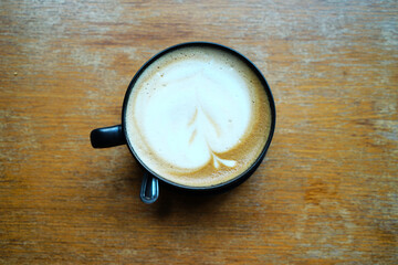 Aromatic and flavorful coffee in a black cup