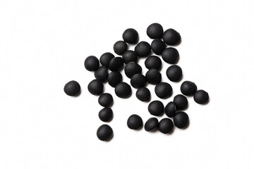 Black beluga lentils on the white background