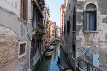 Obraz na płótnie Canvas Panoramic view of Venice narrow canal with historical buildings and boat