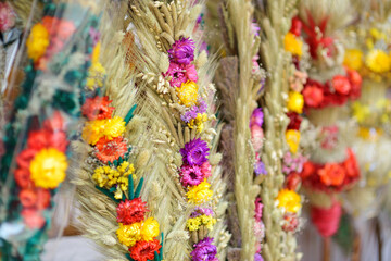 Traditional Lithuanian Easter palms known as verbos sold on Easter market in Vilnius. Lithuanian capital's annual traditional crafts fair is held every March on Old Town streets.