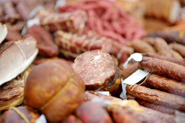 Selection of assorted home made meats, jerky and sausages on a farmer's market in Vilnius, Lithuania.