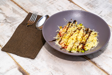 Spaghetti with vegetables and parmesan