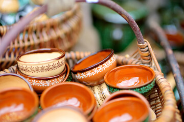 Ceramic dishes, tableware and jugs sold on Easter market in Vilnius. Lithuanian capital's traditional crafts fair is held every March on Old Town streets.