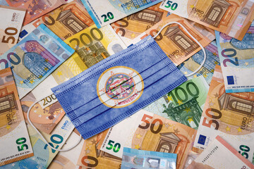 Medical mask with the flag of Minnesota on a variety of european banknotes.(series)