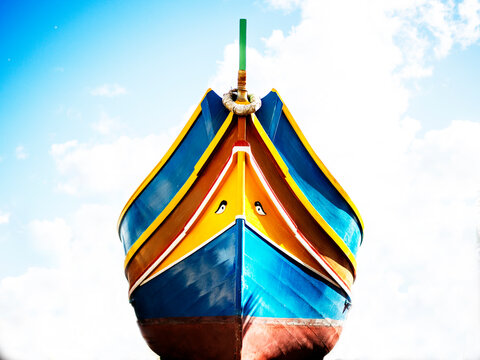 Close-Up low angle view of a traditional multi coloured boat (luzzu), Malta