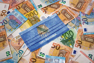 Medical mask with the flag of Oklahoma on a variety of european banknotes.(series)