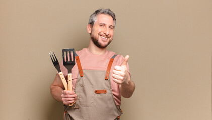 middle age chef man. barbecue concept