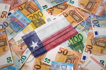 Medical mask with the flag of Texas on a variety of european banknotes.(series)