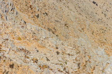 Fototapeta na wymiar Natural texture of a mountain rock for background