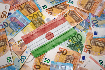 Medical mask with the flag of Niger on a variety of european banknotes.(series)