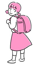 ランドセルを背負って振り向く女の子