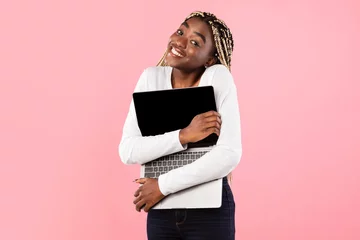 Fotobehang Technology Lover. Excite black woman hugging personal computer © Prostock-studio