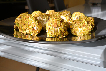 cheese truffles with mortadella and pistachios