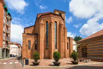 Fototapeta na wymiar Old catholic church under beautiful sky in Alba, Italy.