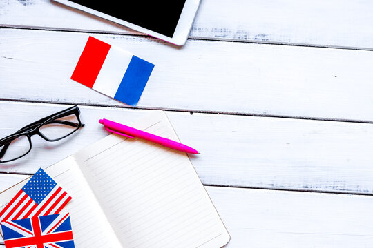 online language school lifestyle on wooden table background top view mockup