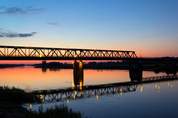 View of a bridge over the Elbe during twilight.