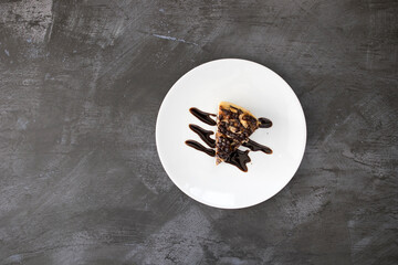 A Slice of Chocolate Carmel Cheesecake