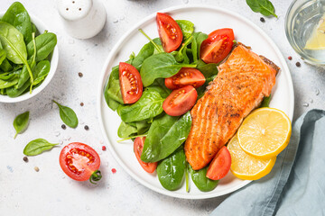 Salmon fillet with fresh salad. Baked salmon. healthy food, keto diet. Healthy lunch or dinner.