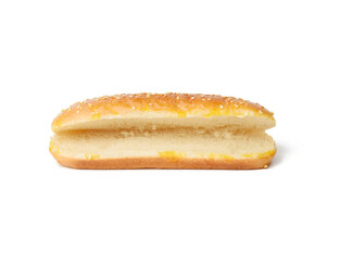 baked oval hot dog bun, baked goods sprinkled with sesame seeds and isolated on white background