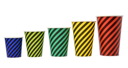 stack of paper disposable striped cups isolated on white background