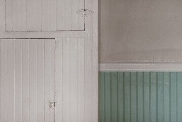 Obraz na płótnie Canvas white wooden door with wall