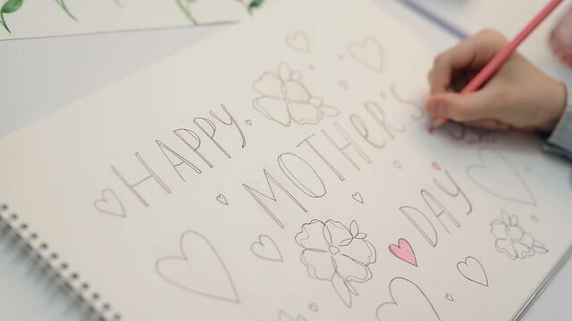 Greeting card Mother's Day. Children's drawing postcard. Gift for mom. Child boy draws picture