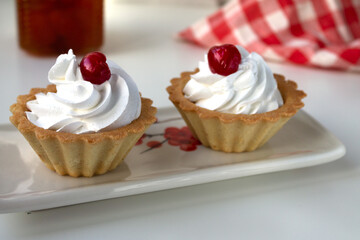 Cake basket with whipped protein cream cherry jam in a basket of shortbread dough is perfect for a tea party